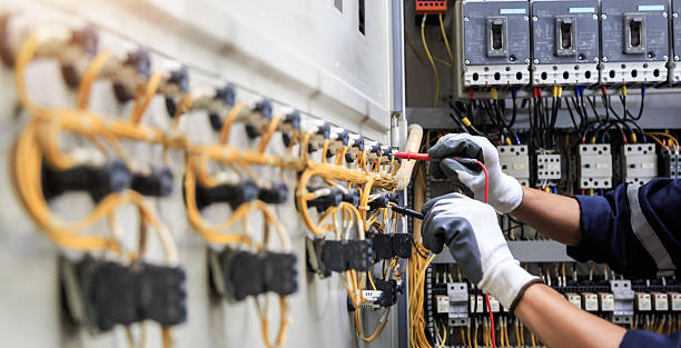 Professional Electrician technician working in Fate, TX
